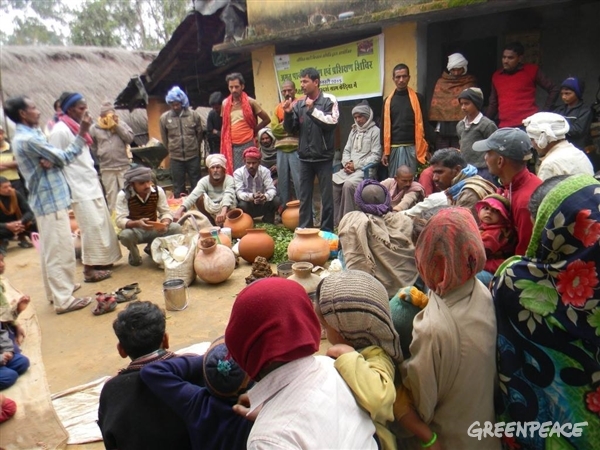 Kedia farmers gather around for a discussion