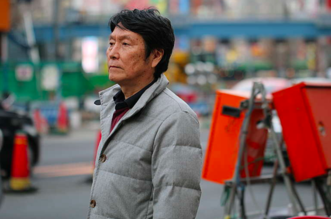 写真:2014年に浪江町で除染作業をしていた池田さん ©︎ Greenpeace
