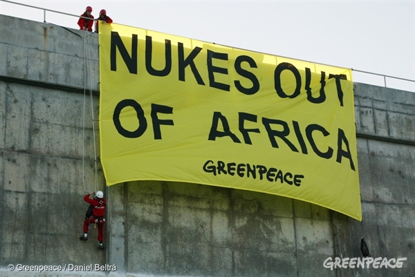 Greenpeace activists from five countries launched a pre-dawn protest at Koeberg, Africa’s only nuclear power plant as world leaders gather in Johannesburg for the Earth Summit. Six activists climbed onto the roof of nearby buildings before dropping a banner that read "Nukes Out of Africa" . Activists were later taken into custody.