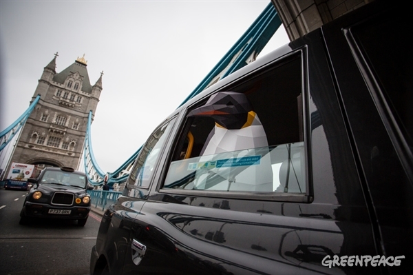 Riding around in a London cab and getting a good look at the beautiful Tower Bridge.