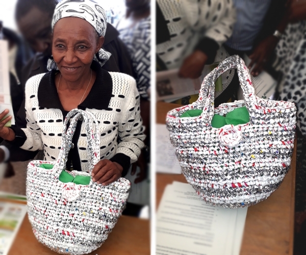 Woman carrying bag made of plastics