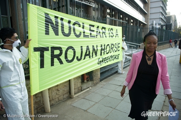 Greenpeace activists protest outside the Department of Energy headquarters in Pretoria against the Department’s lack of transparency around proposed investments in nuclear energy, and to remind the Minister that the nuclear plan is nothing less than a trap - a Trojan horse with a price tag South Africans cannot afford. 