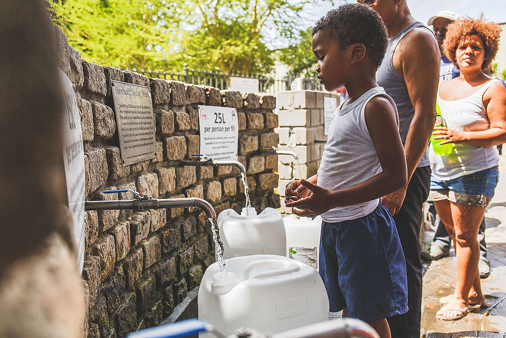 Locals Collect Water at Brewery Spring in Newlands, Cape Town. © Kevin Sawyer