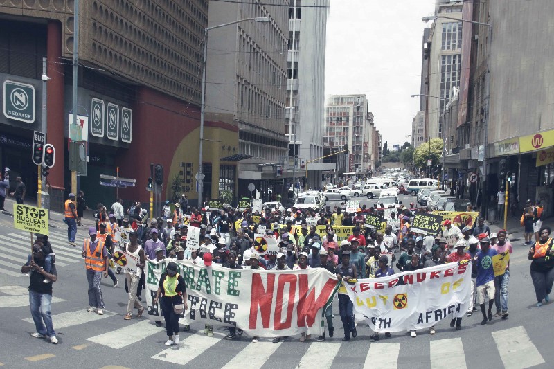 a long shot of many protesters. Fighting against climate change