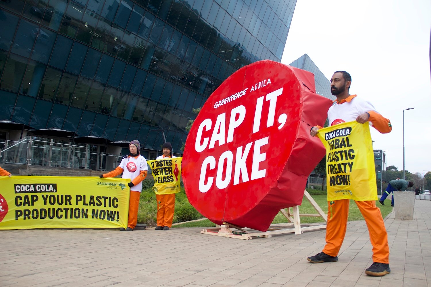 World Environment Day: Greenpeace Africa confronts Coca-Cola, world’s top plastic polluter with giant glass bottle cap installation