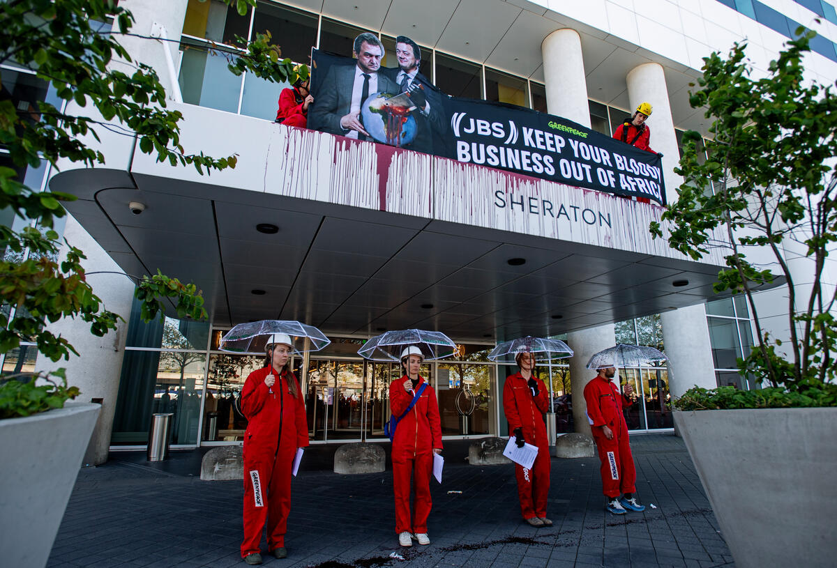 Greenpeace initiate legal action against meat giant JBS, as activists shut down first Dutch shareholder meeting
