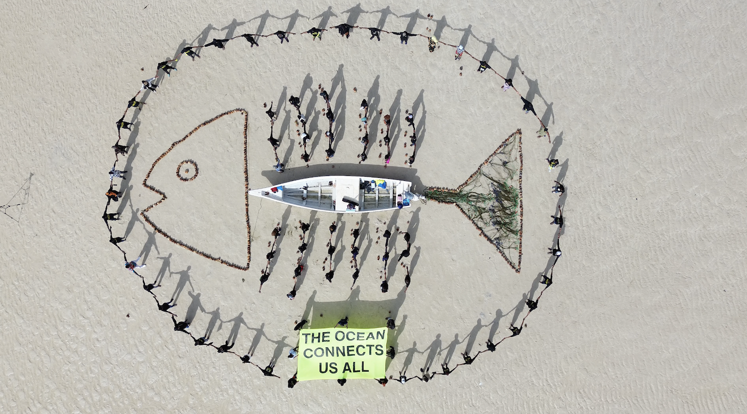 A message in the sand: Greenpeace Africa opens Global Oceans Conference with a demand African governments can not ignore