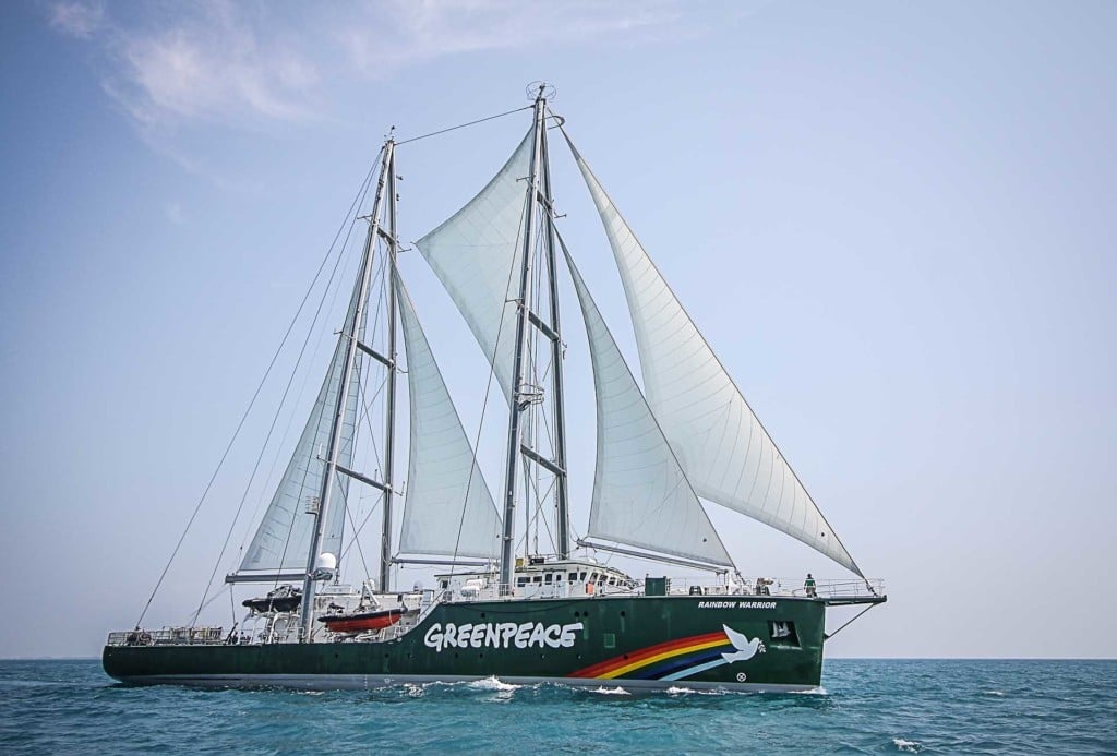 The latest Rainbow Warrior joins with dozens of fishermen boats of Pari island as they hold an action to save Pari island in Thousands Islands, North Jakarta. © Dhemas Reviyanto / Greenpeace
