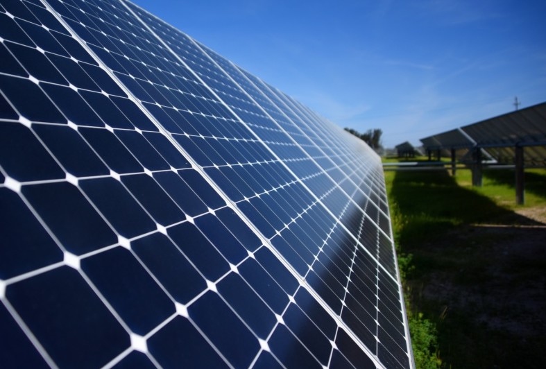 A side on view of a field of solar panels