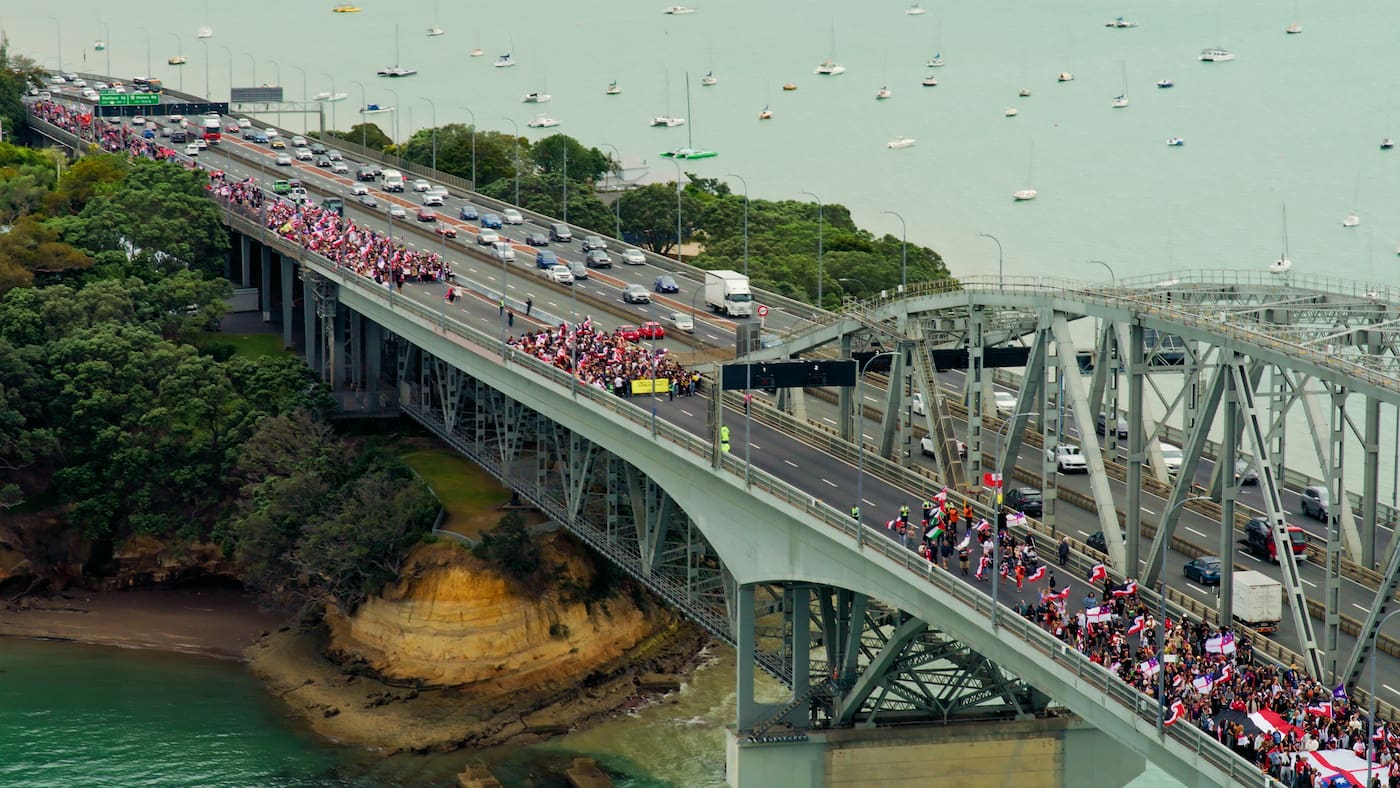 The Hīkoi mō Te Tiriti crosses the Auckland Harbour Bridge on day three of the hīkoi, which is making its way to Parliament in protest of the Government's Treaty Principles Bill.