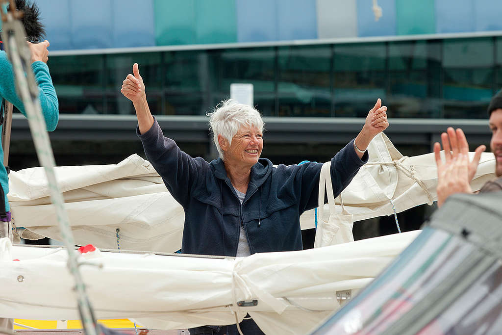 Jeanette Fitzsimons, aboard SV Vega, responds to the crowd gathered at Princes Wharf to welcome the Oil Free Seas Flotilla back to Auckland. The flotilla was protesting against oil giant Anadarko drilling at a site over 100 nautical miles off the west coast of New Zealand, and in waters around a kilometre and a half deep and were at sea for close to three weeks. The Greenpeace sponsored yacht SV Vega spent seven days inside the 500 metre exclusion zone as the Noble Bob Douglas prepared to start drilling.