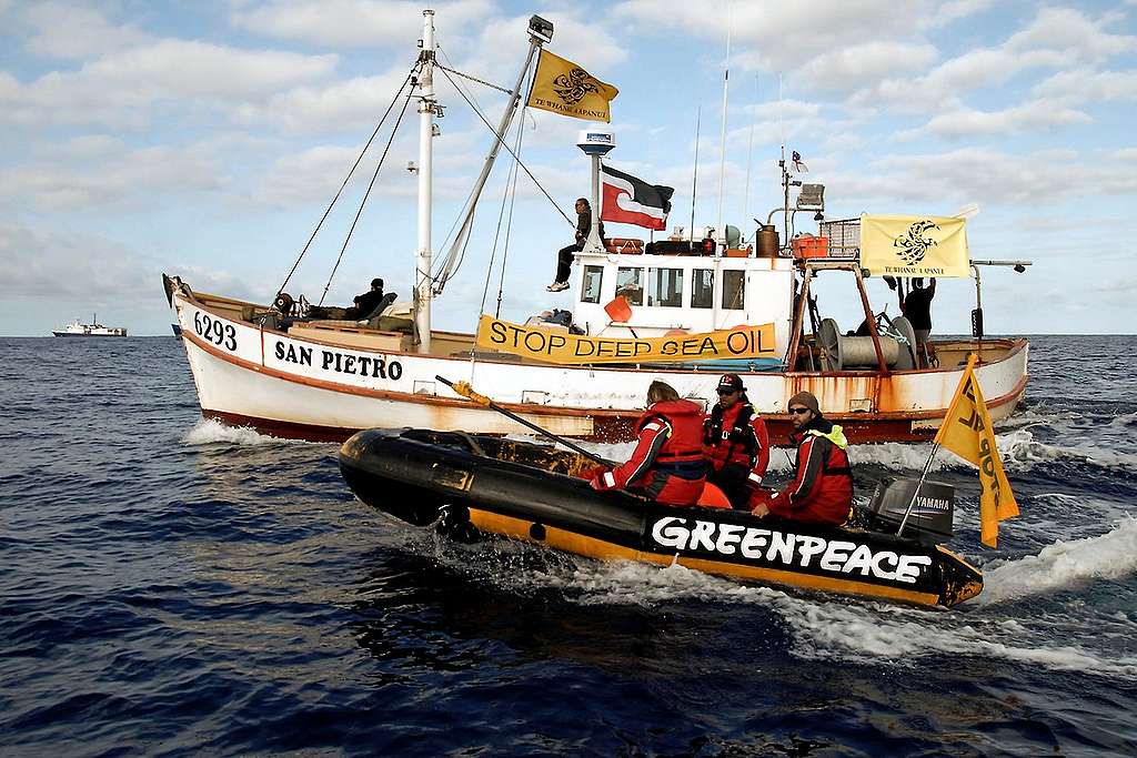 A Greenpeace inflatable boat and a Whānau-ā-Apanui fishing boat disrupt the seismic testing carried out by Brazilian oil giant Petrobras in Raukumara Basin, off East Cape, North Island.