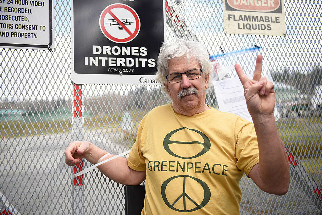 Greenpeace International founder Rex Weyler stands in solidarity with Indigenous Peoples to stop a new Kinder Morgan pipeline from being built.  They joined indigenous activists, senior citizens and other activists to block the gates to Kinder MorganÕs construction site on Burnaby Mountain in British Columbia.  In solidarity with Coast Salish communities, they aim to show the world that Canada is going down the wrong path on climate and on reconciliation with Indigenous Nations in building this pipeline.