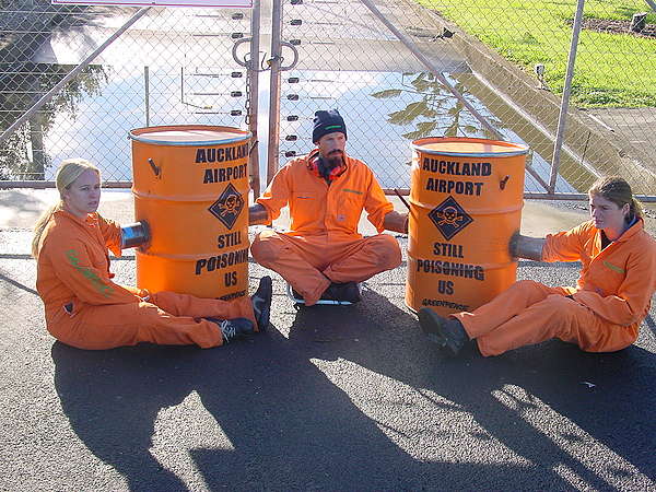 Greenpeace activists block trucks carrying quarantine and medical waste from entering the incinerator at Auckland International Airport.