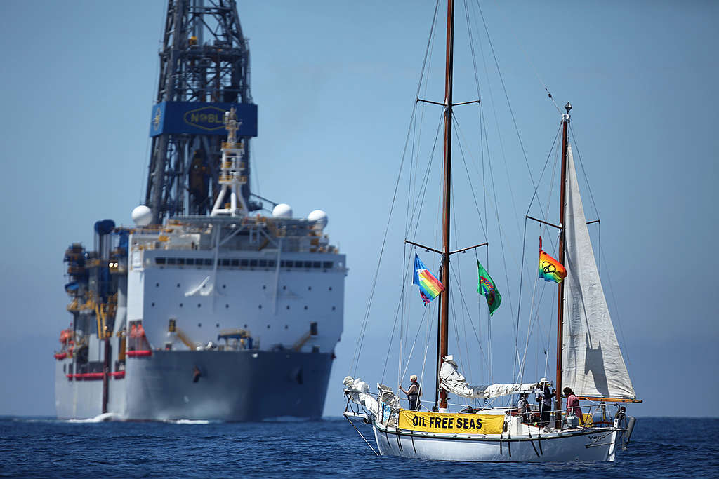 SV Vega confronts the Noble Bob Douglas drilling ship on the site where oil giant Anadarko intends to start exploratory drilling for deep sea oil. The drill site was over 100 nautical miles off Raglan, on the west coast of New Zealand, and in waters around a kilometer and a half deep. On board was Jeanette Fitzsimons and Bunny McDiarmid and they intentionally broke the Anadarko Amendment but were never charged.
