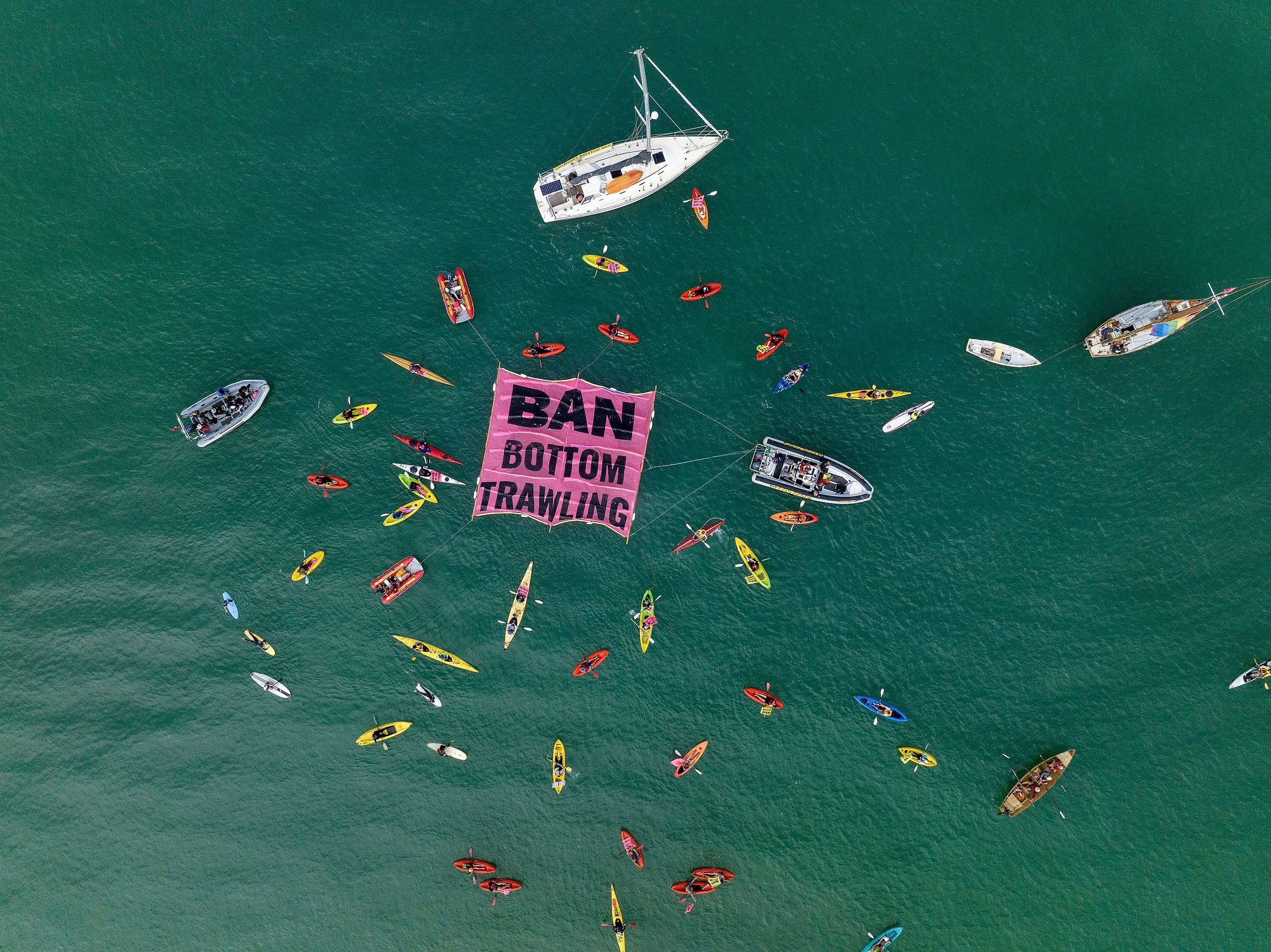 Bottom trawling banner at Mission Bay in Auckland. Drone photography by Echo Valley