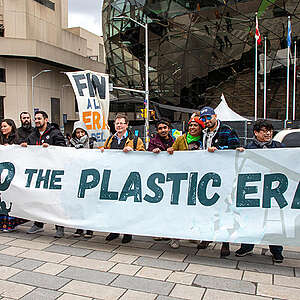 A group including CIEL hold the banner in front of the Shaw Center during the rally.
Civil society groups from around the world come together in a mass mobilization at the fourth session of the Intergovernmental Negotiating Committee (INC-4) meetings in Ottawa, Canada.  The negotiations are a pivotal moment where we can make or break the Global Plastics Treaty. Pressure on the negotiation process is high as they move into the last year of the process and are still far from a Treaty that would truly address the plastics crisis, including the harms that plastic causes to communities across its entire life cycle.