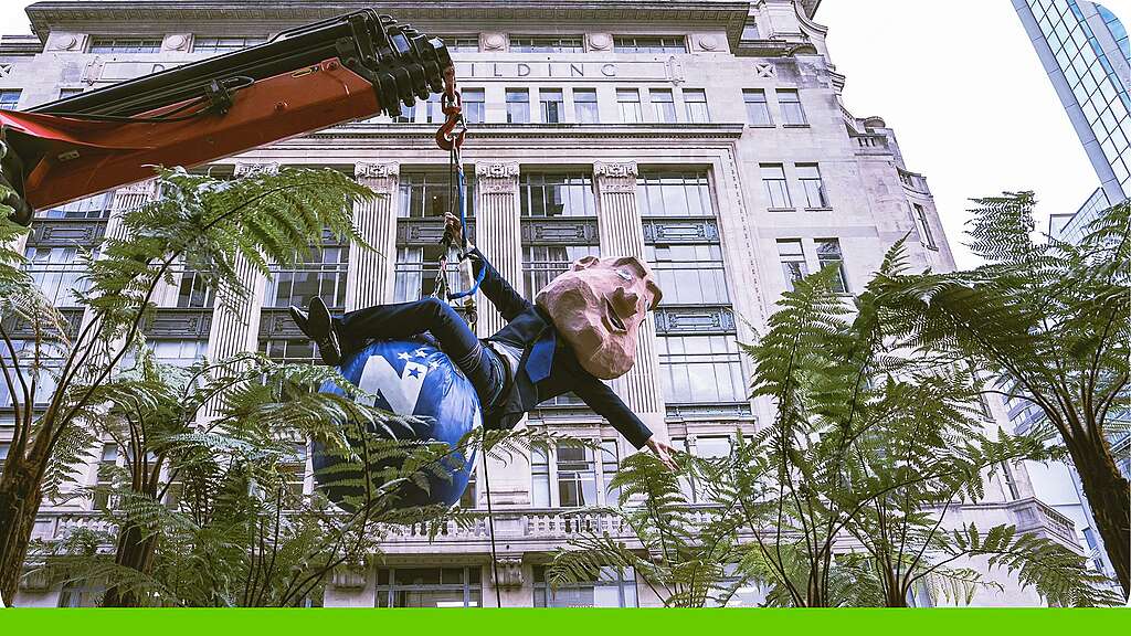 A Prime Minister Christopher Luxon lookalike has been swinging through Auckland atop a National Party-blue wrecking ball to promote the March for Nature protest on 8 June. A paper mache Luxon-lookalike swings atop a National Party-blue wrecking ball, surrounded by trees