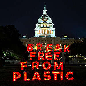 A Break Free From Plastic message lights up the night near the U.S. Capitol Building in Washington. 
Its already no secret that big brands are driving the plastic pollution crisis. In 2020, Coca-Cola, PepsiCo, and Nestle were once again named the world's biggest corporate polluters. These companies' business models are built on greenwashing customers into falsely believing recycling will fix plastic pollution. It is also built on keeping the fossil fuel industry in business by continuing to churn out a never ending supply of cheap, single-use plastic. 
As the fossil fuel industry doubles down on plastic bottles and packaging, Coca-Cola, PepsiCo, and Nestle will be the next key villains in driving the climate crisis. 99% of plastic is made from fossil fuels, like fracked gas and oil, and it contributes to climate change at every step of its lifecycle, from extraction to refinement, manufacture, transportation, disposal, and waste.