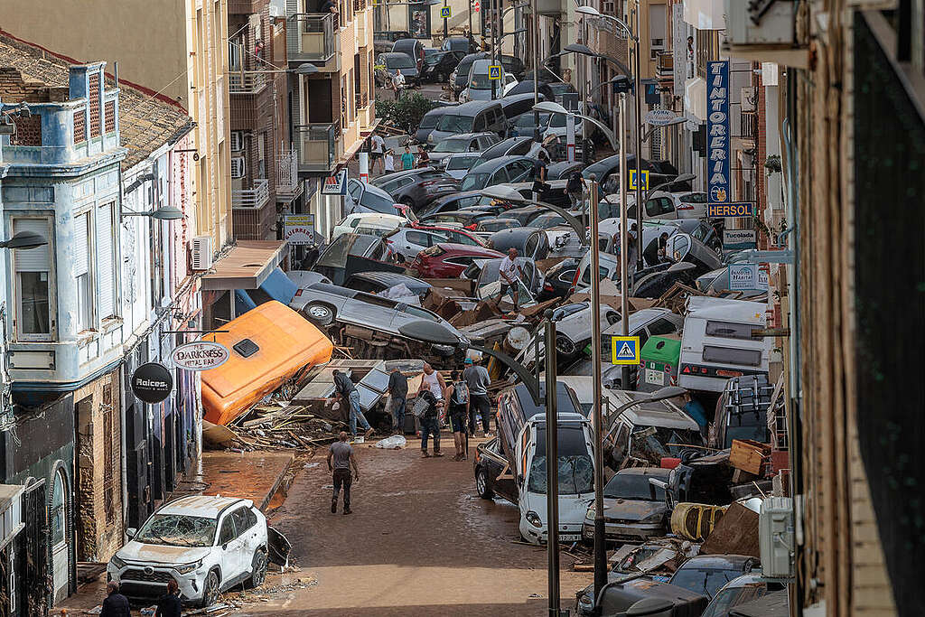 Cars are piled up in the street like river stones following severe flooding in Spain Cars are piled up in the street like river stones following severe flooding in Spain