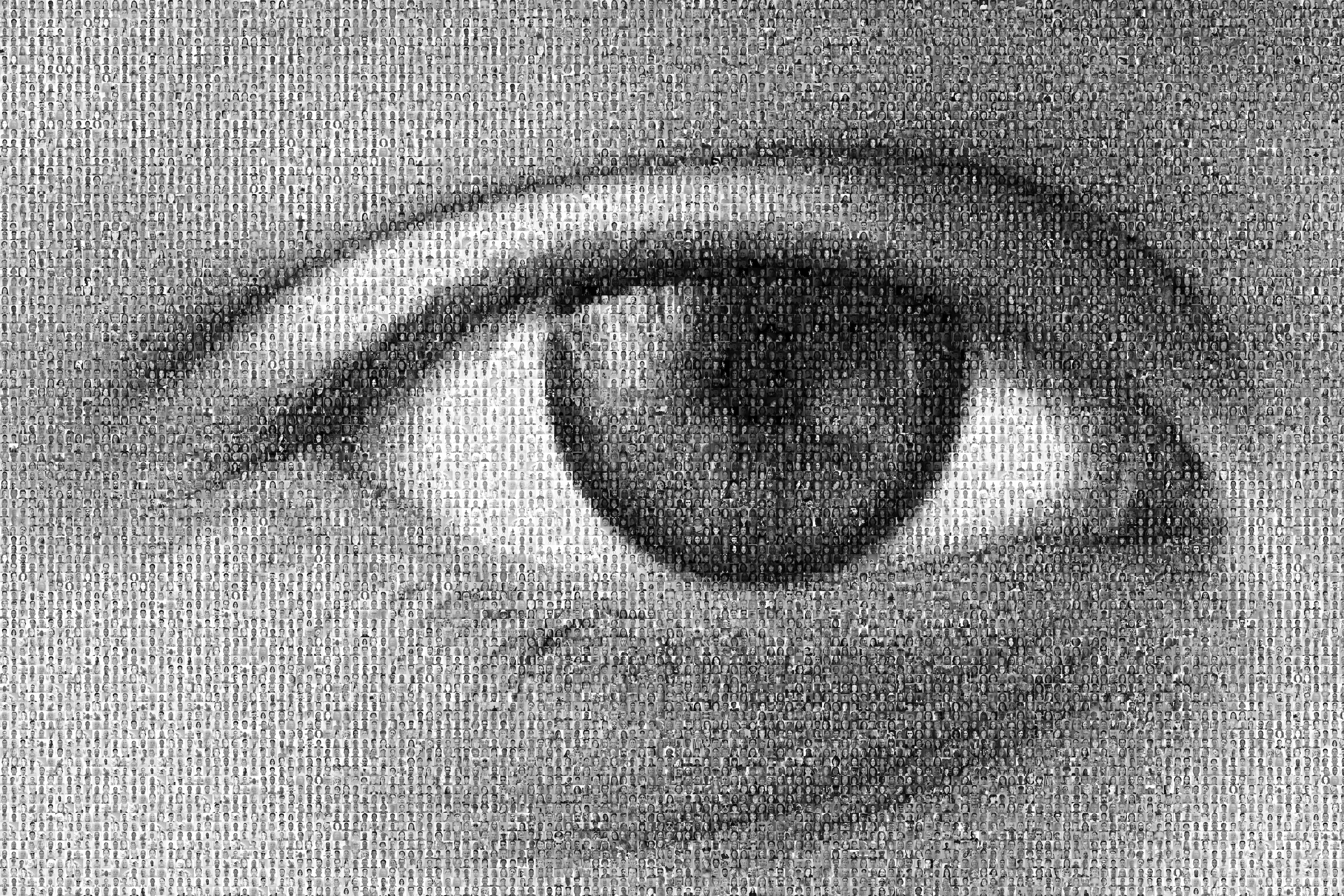 An eye made up of thousands of small portraits
