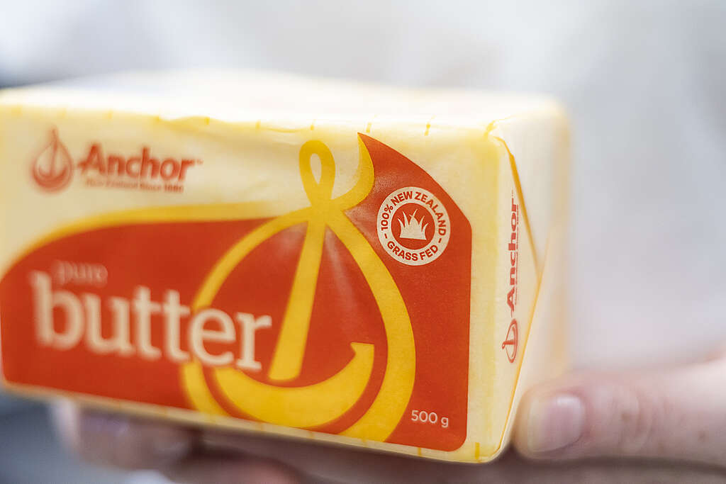 A close up of Anchor butter, highlighting the '100% New Zealand grass fed' logo