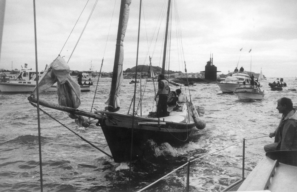 The USS Phoenix submarine is met by the Peace Squadron as it arrives in Waitemata harbour, Auckland on 9 November, 1983. The growing anti-nuclear movement in New Zealand was hostile to visits from US ships because the Americans refused to confirm or deny whether their ships carried nuclear weapons. Public opinion was increasingly in favour of banning these visits. Between 1978 and 1983 opposition to nuclear-armed ship visits rose from 32% to 72%. In 1985 the Government effectively banned nuclear ship visits. New Zealand was the first country to declare itself nuclear free when it passed legislation in 1987.