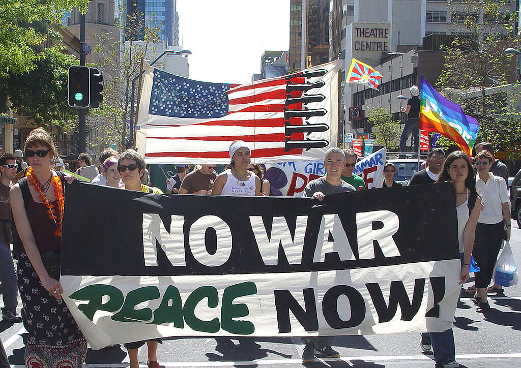 Saturday 20th March marks the anniversary of the invasion of Iraq by the United States and its so-called 'coalition of the willing.' In Wellington, people took to the streets demanding that the Government 'End all New Zealand support for Bush's Wars.' There was a huge march in protest of the war and to mark a global day of action. Activists hold up a banner "No War Peace Now!". Saturday 20th March marks the anniversary of the invasion of Iraq by the United States and its so-called 'coalition of the willing.' In Wellington, people took to the streets demanding that the Government 'End all New Zealand support for Bush's Wars.' There was a huge march in protest of the war and to mark a global day of action. Activists hold up a banner "No War Peace Now!".