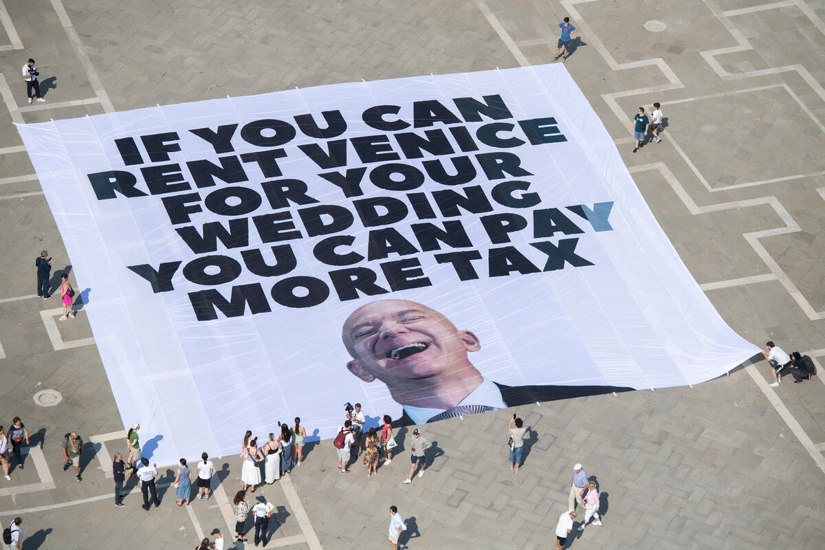 ‘Everyone Hates Elon’ and Greenpeace unfold giant banner on Piazza San Marco ahead of Bezos’ wedding 