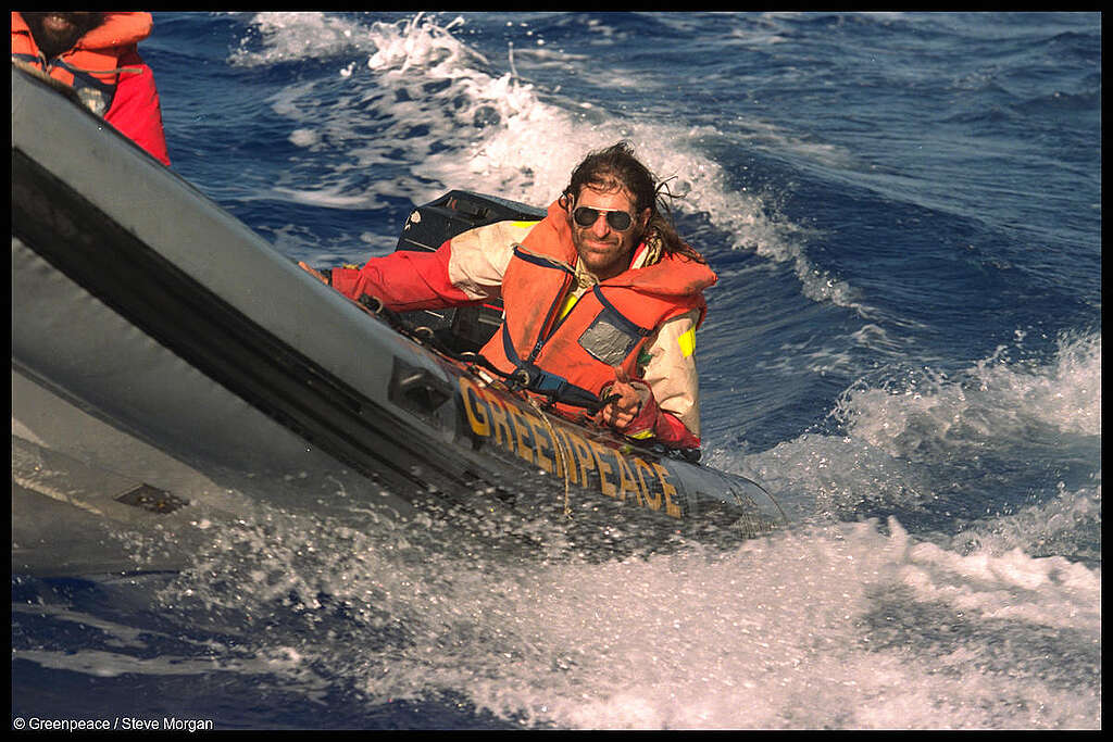 SV Rainbow Warrior II crew member Alice Leney driving an inflatable boat (Photo: Greenpeace/Steve Morgan).