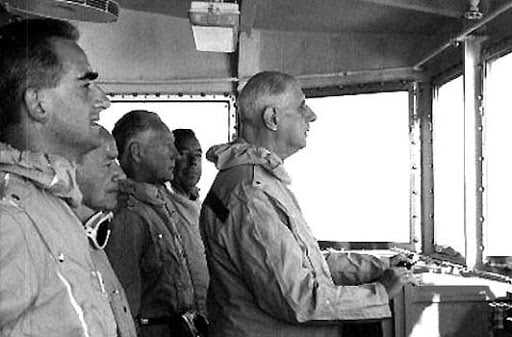 French President Charles De Gaulle flanked by his Minister of Armies Pierre Messmer and Minister of Information Alain Peyrefitte watching a nuclear test at Moruroa codenamed Betelgeuse on 11 September 1966 (Photo: Wikipedia Commons).