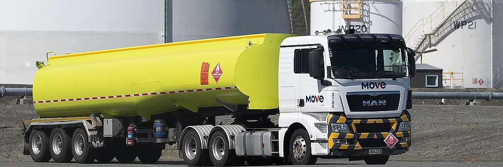 a yellow oil truck