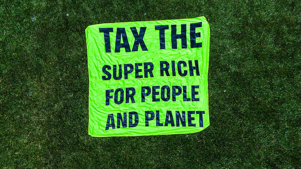 United Nations Tax Convention Activity ahead of COP30 in Nairobi - Drone 500 Greenpeace Africa volunteers are peacefully gathering to send out a powerful message to governments to tax the super-rich, ahead of the UN Framework Convention in International Tax Cooperation (also known as UN Tax Convention or UNTC) negotiations taking place in Nairobi from 10-19 November. Together, they form a human banner of the African continent with a printed banner that says Tax the Super-rich for People and Planet.