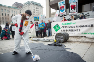 #NoToPipelines Action at Desjardins General Assembly in Quebec