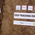 The top 5 plastic polluters identified through 5 Canadian brand audit events are named through an aerial banner shot at Kitsilano Beach in Vancouver, British Columbia, where one of the audits was conducted.
The banner reads “Stop trashing our future!” and shows the logos of Nestle, Tim Hortons, PepsiCo, Coca Cola and McDonalds.