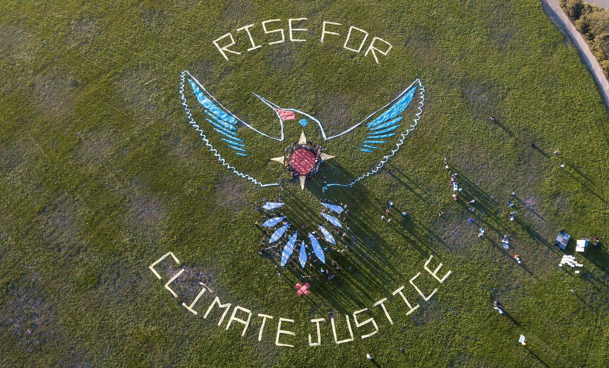 Hummingbird Rising: Human Mandala for Climate Justice in San Francisco. © Josh Edelson