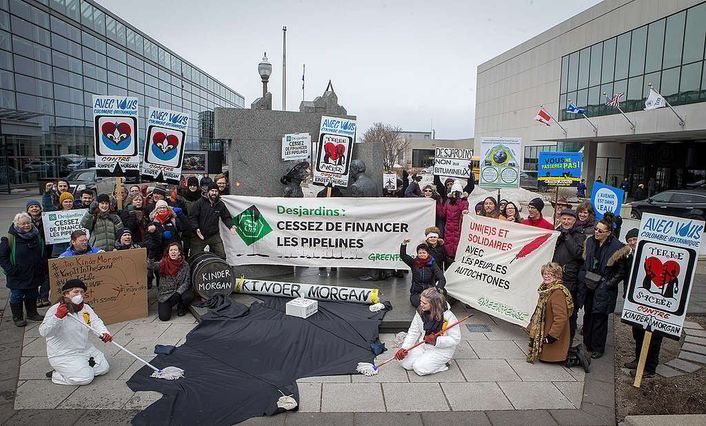 #NoToPipelines Action at Desjardins General Assembly in Quebec. © Greenpeace #NoToPipelines Action at Desjardins General Assembly in Quebec. © Greenpeace