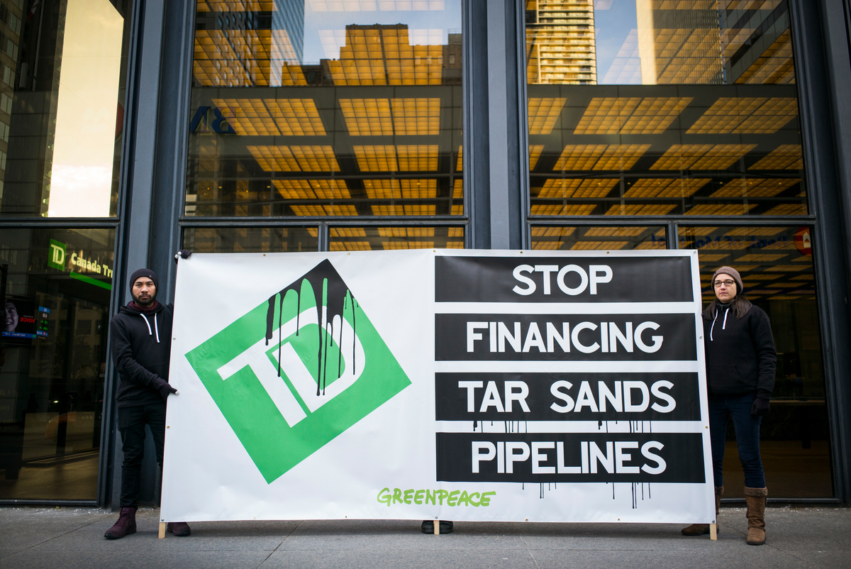 Action at TD Bank in Toronto. © Ian Willms / Greenpeace