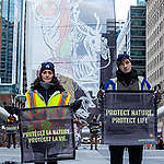 Banner at Montreal’s l’Anneau as COP15 Begins.