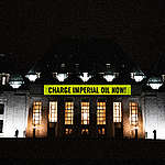 <strong>Greenpeace calls for Imperial Oil to be charged over Kearl spill, projects message on Supreme Court </strong>