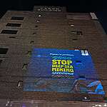 Greenpeace calls on Canada to help stop deep sea mining, projecting the deep ocean in downtown Montreal