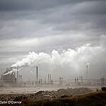 Smoke Billowing over Oil Plants