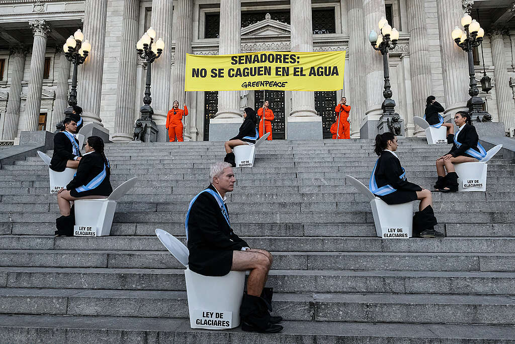 Greenpeace Andino activists stage a protest at the entrance to the National Congress in Buenos Aires, Argentina.