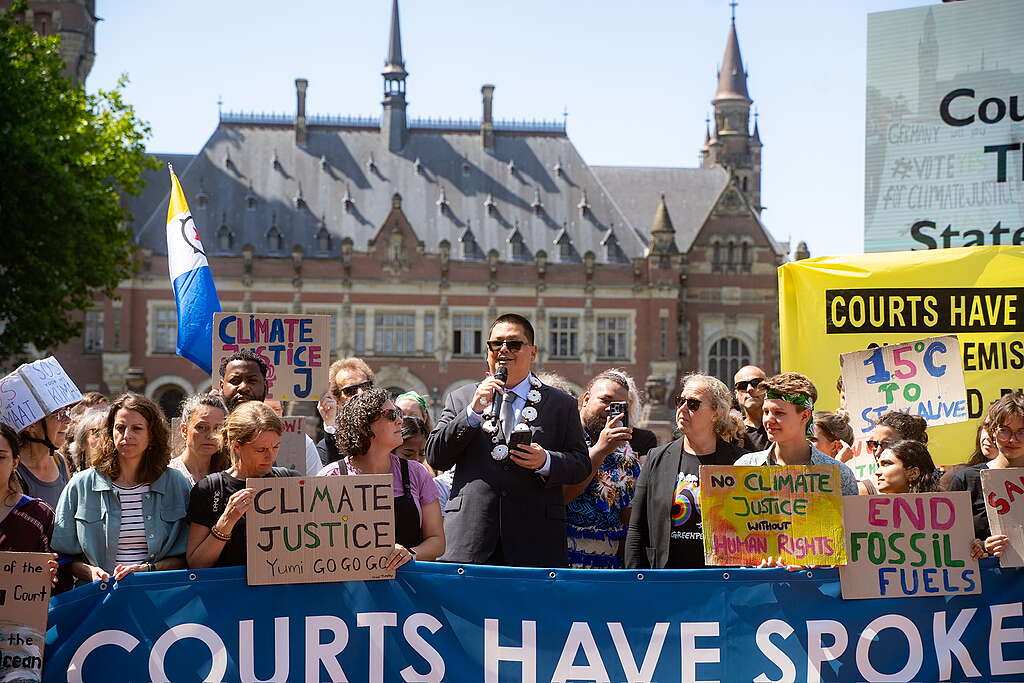 Youth leaders and members of frontline communities demonstrated in front of The International Court of Justice, in The Hague, in July 2025.