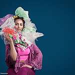A studio shot showing a woman with a plastic bags as hair decoration to visualise the pathetic dependence on plastic in people’s daily life.