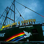 The Rainbow Warrior is lit up as a “beacon of resistance” in Auckland today on the eve of the 40th anniversary of the bombing of the original Rainbow Warrior by French Government agents in 1985.
Twenty crew and Greenpeace Aotearoa staff and volunteers hold letters of light spelling out the iconic phrase, You Can’t Sink A Rainbow.