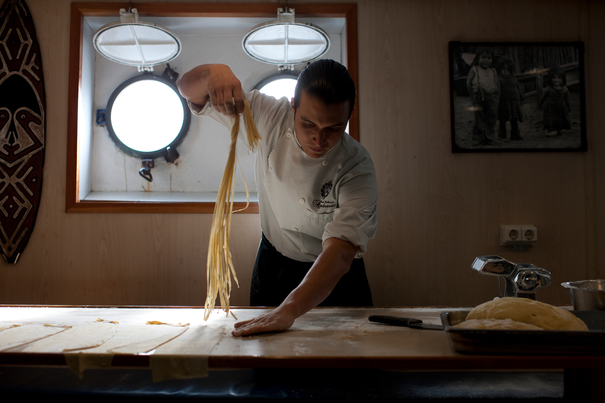Cook on MY Esperanza. © Nick Cobbing / Greenpeace