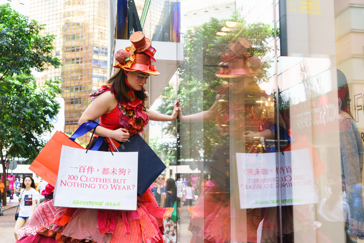 ‘Giant Girl’ in Upcycled Dress Action in Hong Kong. © Greenpeace / Patrick Cho