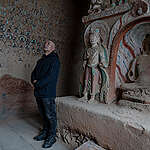 Ancient Buddhist art in peril as extreme rainfall hits China’s Silk Road