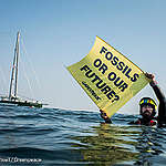 German activist Fabian swims with a banner reading "Fossils or our future?".
Greenpeace Denmark activists from the Greenpeace ship Rainbow Warrior, prepare ahead of carrying out an action in the Danish North Sea, to demand an immediate ban on all further oil and gas exploration in Denmark, followed by a complete phase out of domestic fossil fuel production and a massive expansion of clean offshore wind power.
Unless the Danish government is brave enough to ban the search for new oil and gas in Denmark, it will never be the green frontrunner it claims to be.